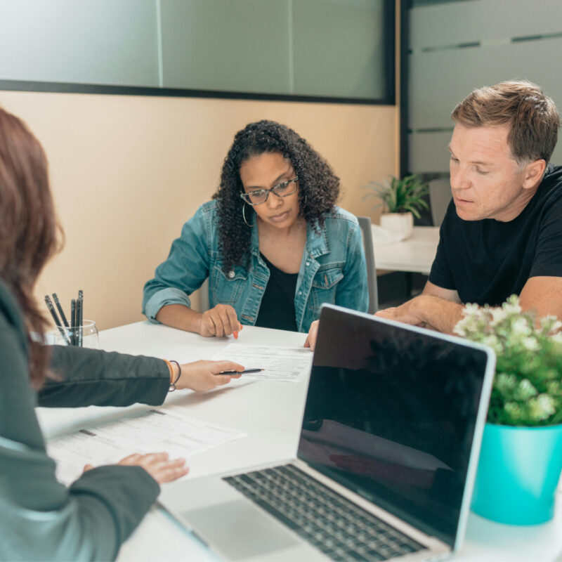 A couple opening up bank accounts